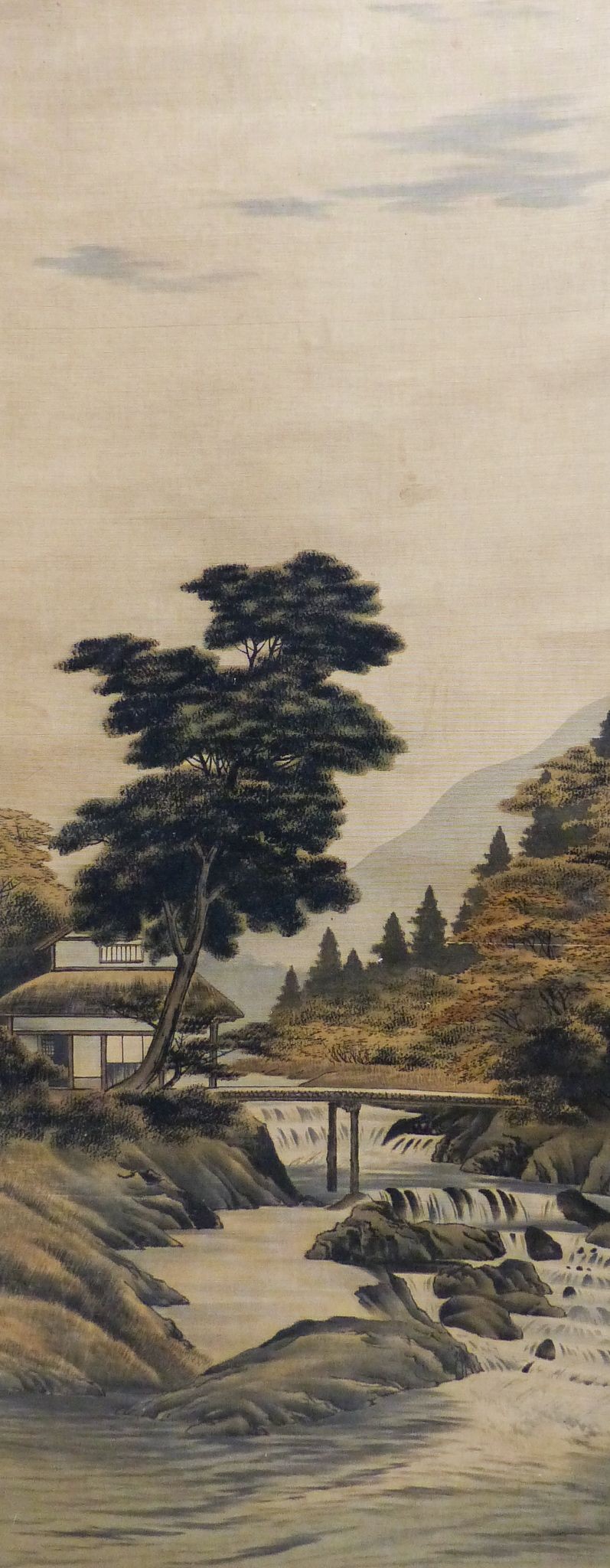 An early 20th century Japanese painted felt and watercolour landscape scroll